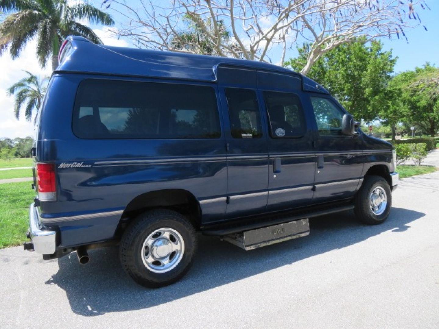 2011 Dark Blue /Gray Ford E-Series Wagon E-350 XLT Super Duty (1FBNE3BS4BD) with an 6.8L V10 SOHC 20V engine, located at 4301 Oak Circle #19, Boca Raton, FL, 33431, (954) 561-2499, 26.388861, -80.084038 - You are looking at a Gorgeous 2011 Ford Econoline E350 XLT Norcal Max High Top Handicap Wheelchair Conversion Van with 6.8L V10, 15K Original Miles, 9 Inch Lowered Floor, Braun UVL Side Entry Wheelchair Lift, Remote Control Power Side Entry Doors, Expanded Side Entry Doors, Q Straint Tie Down, Syste - Photo#16